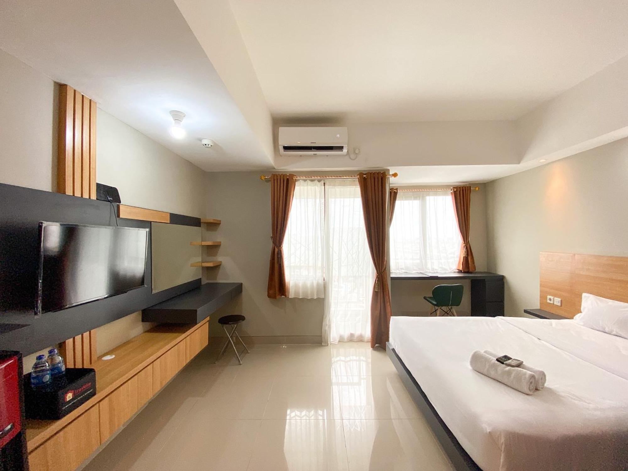 Comfy At Gateway Park Lrt By Travelio Apartemen *
